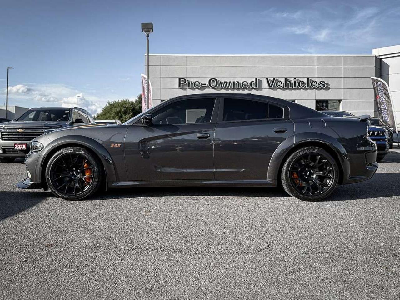2023 Dodge Charger Scat Pack 392   WIDEBODY   HEMI ORANGE PKG   FRONT 3M   PLUS GROUP   CARBON AND SUEDE PKG   SUNROOF Photo