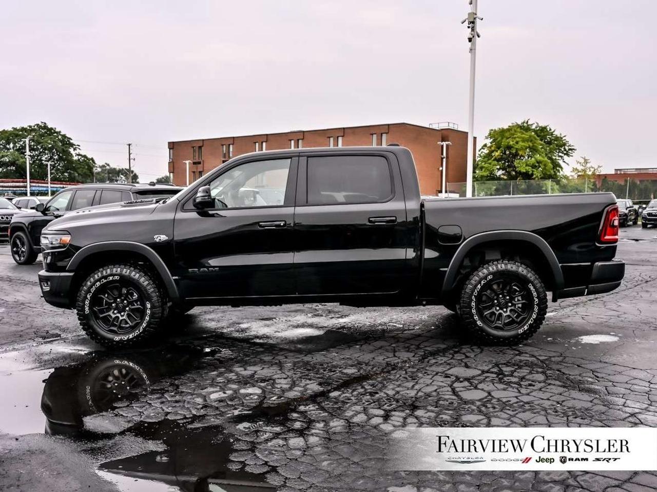 2026 RAM 1500 Rebel 4x4 Crew Cab 5'7 Box 5.7 L HEMI   PANO ROOF   LEATHER   NAVI   LEVEL 2   HARMAN/KARDON   CARPLAY Photo