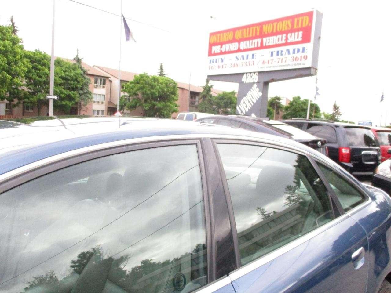 2005 Audi A6 4dr Sdn 4.2L quattro Auto Photo