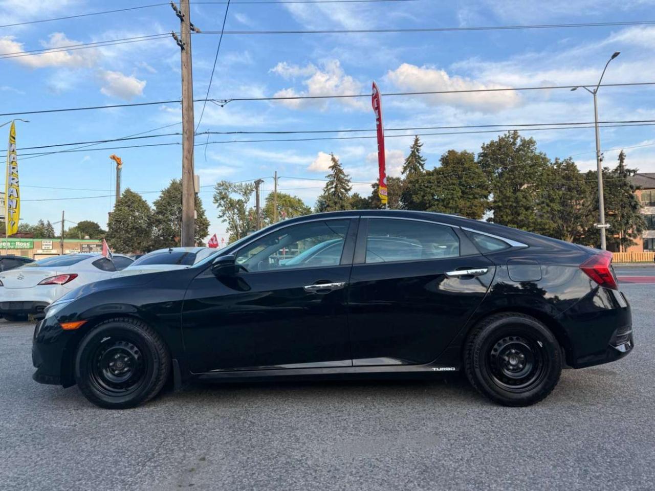2017 Honda Civic 4dr CVT Touring Photo