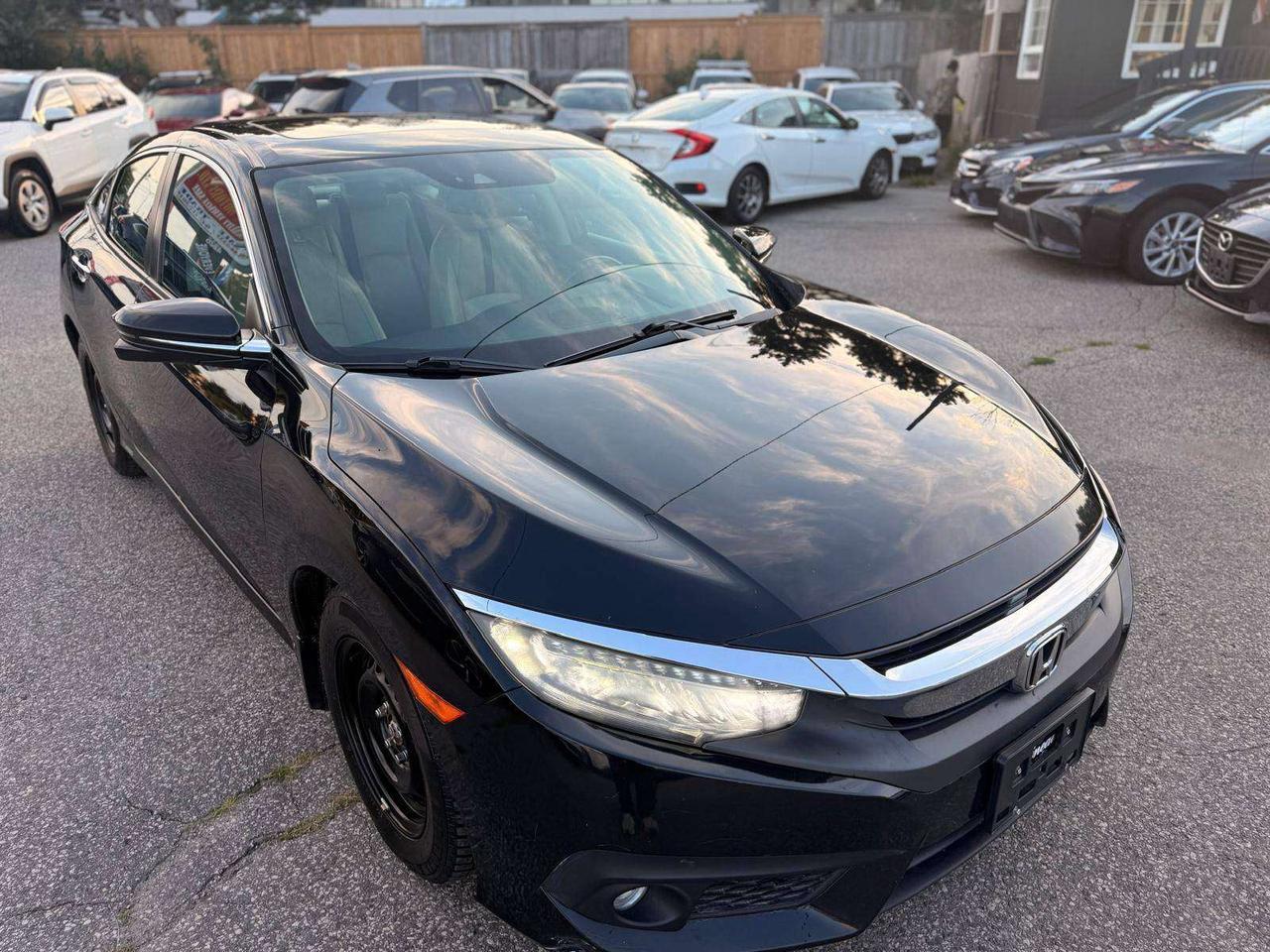 2017 Honda Civic 4dr CVT Touring Photo