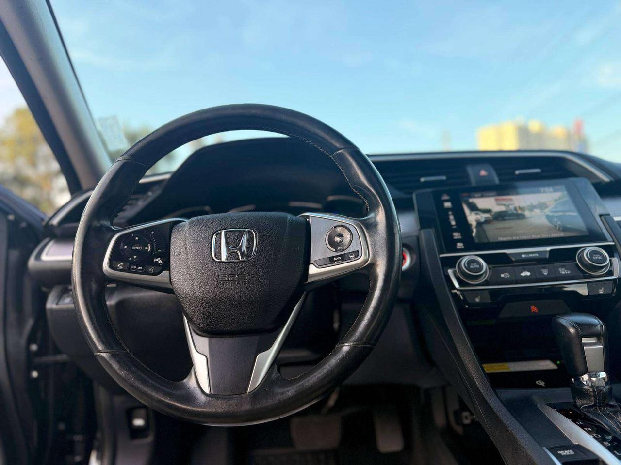 2017 Honda Civic 4dr CVT Touring Photo