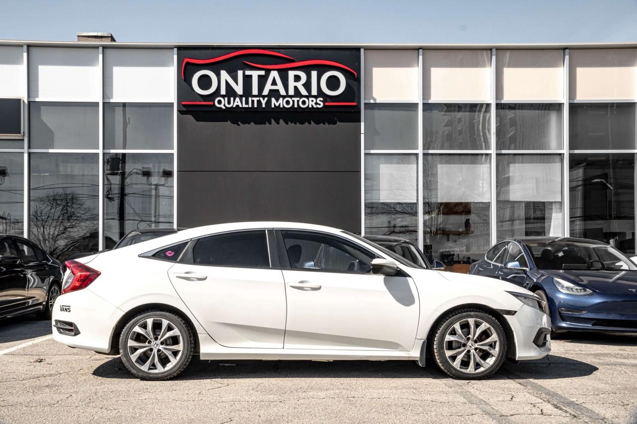 2016 Honda Civic 4dr Man LX Photo3