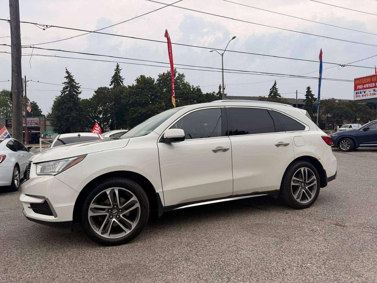 2017 Acura MDX SH-AWD 4dr Nav Pkg Photo2