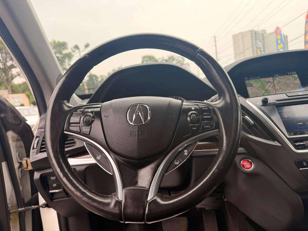 2017 Acura MDX SH-AWD 4dr Nav Pkg Photo