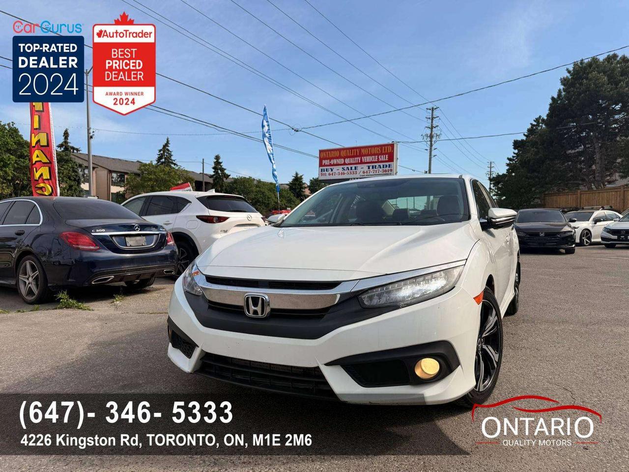 2017 Honda Civic 4dr CVT Touring Photo