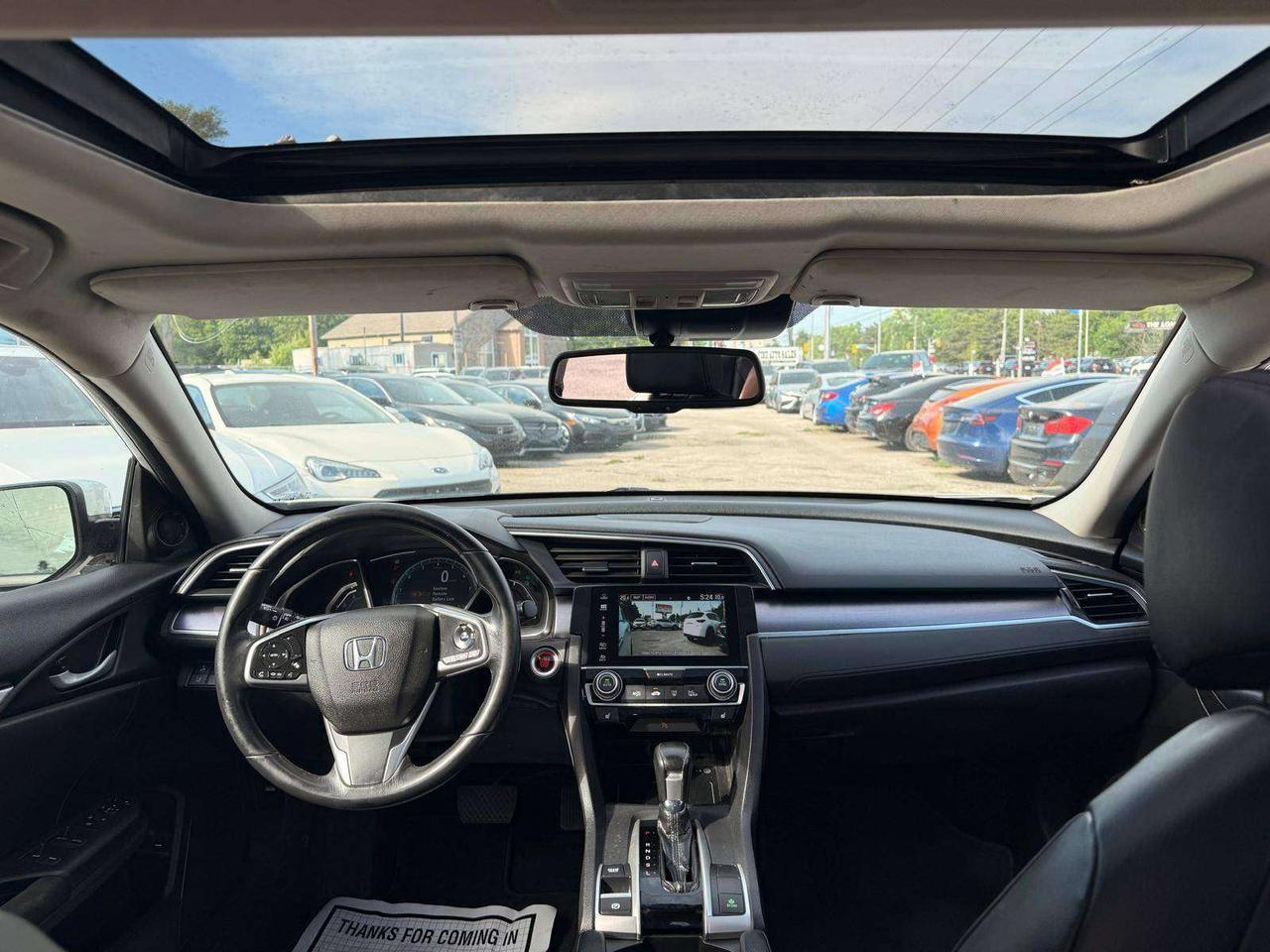 2017 Honda Civic 4dr CVT Touring Photo