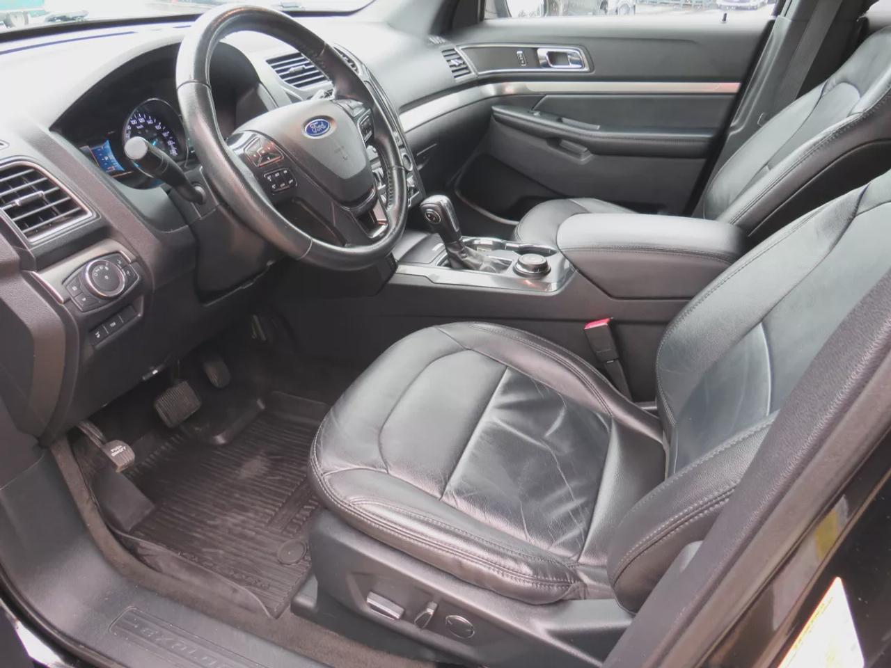 2018 Ford Explorer XLT | 4WD | Automatic | Alloy Wheels | Twin-Panel Moonroof | Power Liftgate | Dual-Zone Climate Control | Touchscreen | Navigation | Bluetooth | Back-Up Camera | Rear Park Assist | Remote Start | Cruise Control | Leather-Wrapped Steering Wheel | Garage Do Photo