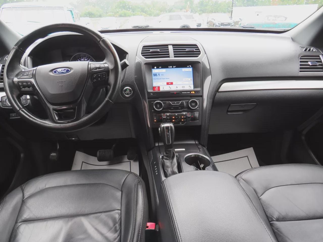 2018 Ford Explorer XLT | 4WD | Automatic | Alloy Wheels | Twin-Panel Moonroof | Power Liftgate | Dual-Zone Climate Control | Touchscreen | Navigation | Bluetooth | Back-Up Camera | Rear Park Assist | Remote Start | Cruise Control | Leather-Wrapped Steering Wheel | Garage Do Photo