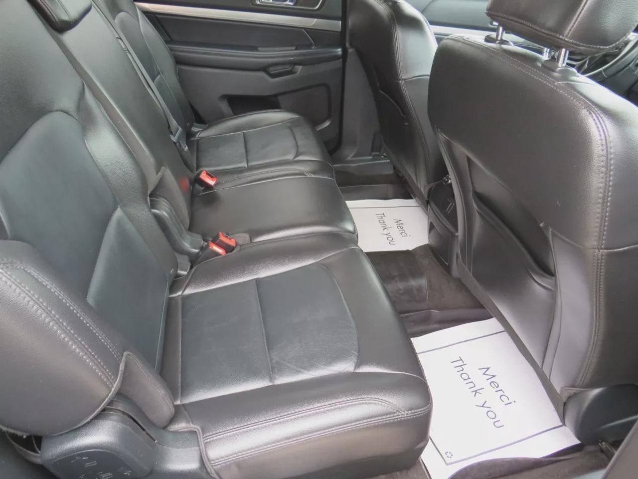 2018 Ford Explorer XLT | 4WD | Automatic | Alloy Wheels | Twin-Panel Moonroof | Power Liftgate | Dual-Zone Climate Control | Touchscreen | Navigation | Bluetooth | Back-Up Camera | Rear Park Assist | Remote Start | Cruise Control | Leather-Wrapped Steering Wheel | Garage Do Photo