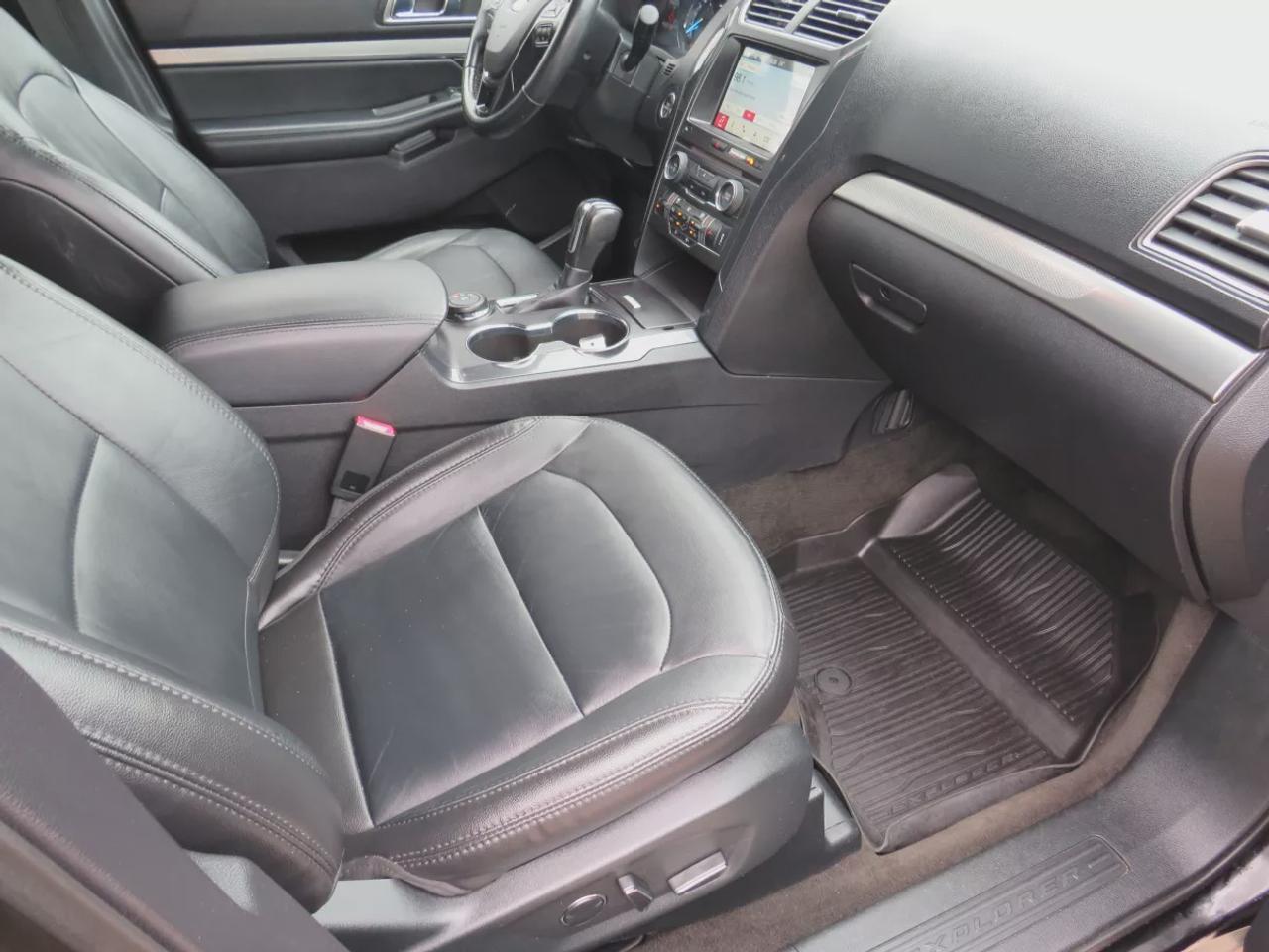 2018 Ford Explorer XLT | 4WD | Automatic | Alloy Wheels | Twin-Panel Moonroof | Power Liftgate | Dual-Zone Climate Control | Touchscreen | Navigation | Bluetooth | Back-Up Camera | Rear Park Assist | Remote Start | Cruise Control | Leather-Wrapped Steering Wheel | Garage Do Photo