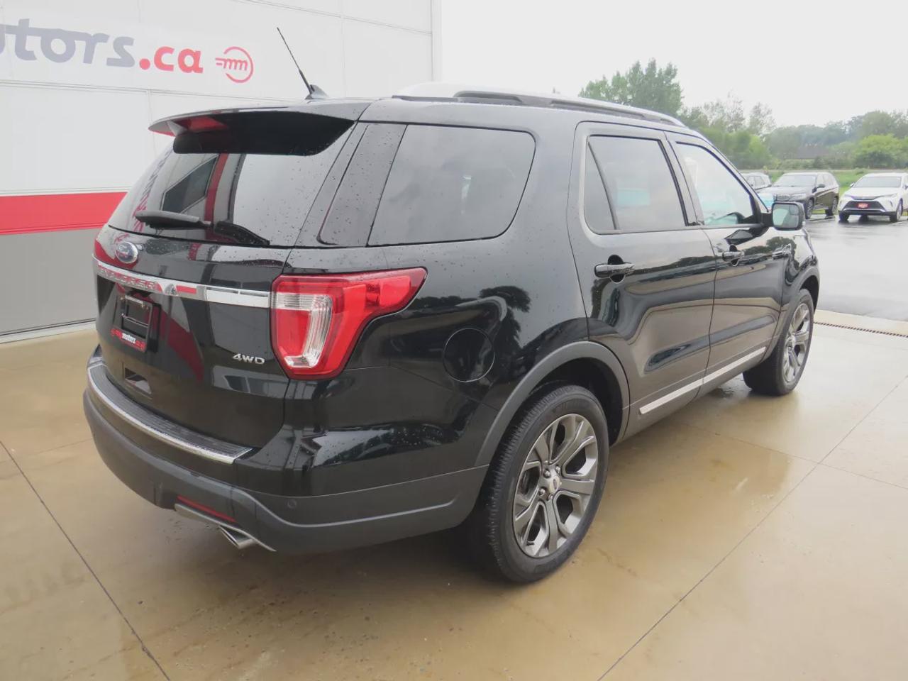 2018 Ford Explorer XLT | 4WD | Automatic | Alloy Wheels | Twin-Panel Moonroof | Power Liftgate | Dual-Zone Climate Control | Touchscreen | Navigation | Bluetooth | Back-Up Camera | Rear Park Assist | Remote Start | Cruise Control | Leather-Wrapped Steering Wheel | Garage Do Photo