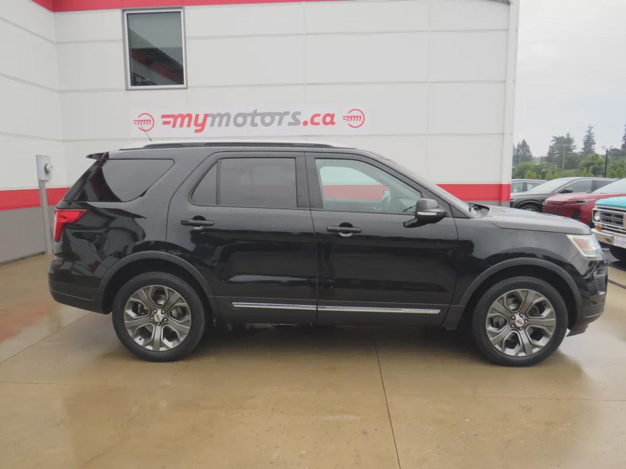 2018 Ford Explorer XLT | 4WD | Automatic | Alloy Wheels | Twin-Panel Moonroof | Power Liftgate | Dual-Zone Climate Control | Touchscreen | Navigation | Bluetooth | Back-Up Camera | Rear Park Assist | Remote Start | Cruise Control | Leather-Wrapped Steering Wheel | Garage Do Photo