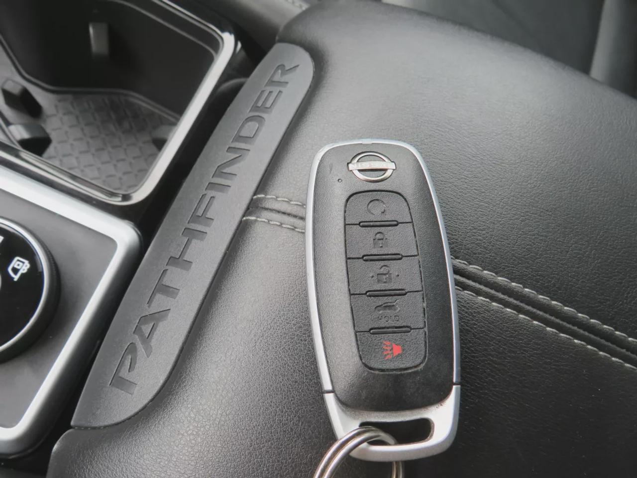 2024 Nissan Pathfinder SL | 4WD | 8 Passenger | Automatic | Alloy Wheels | Panoramic Moonroof | Leather Seats | Heated Front Seats | Heated Steering Wheel | Tri-Zone Climate Control | Touchscreen Display | Wireless Apple CarPlay & Android Auto | Wireless Charging | Bluetooth |  Photo