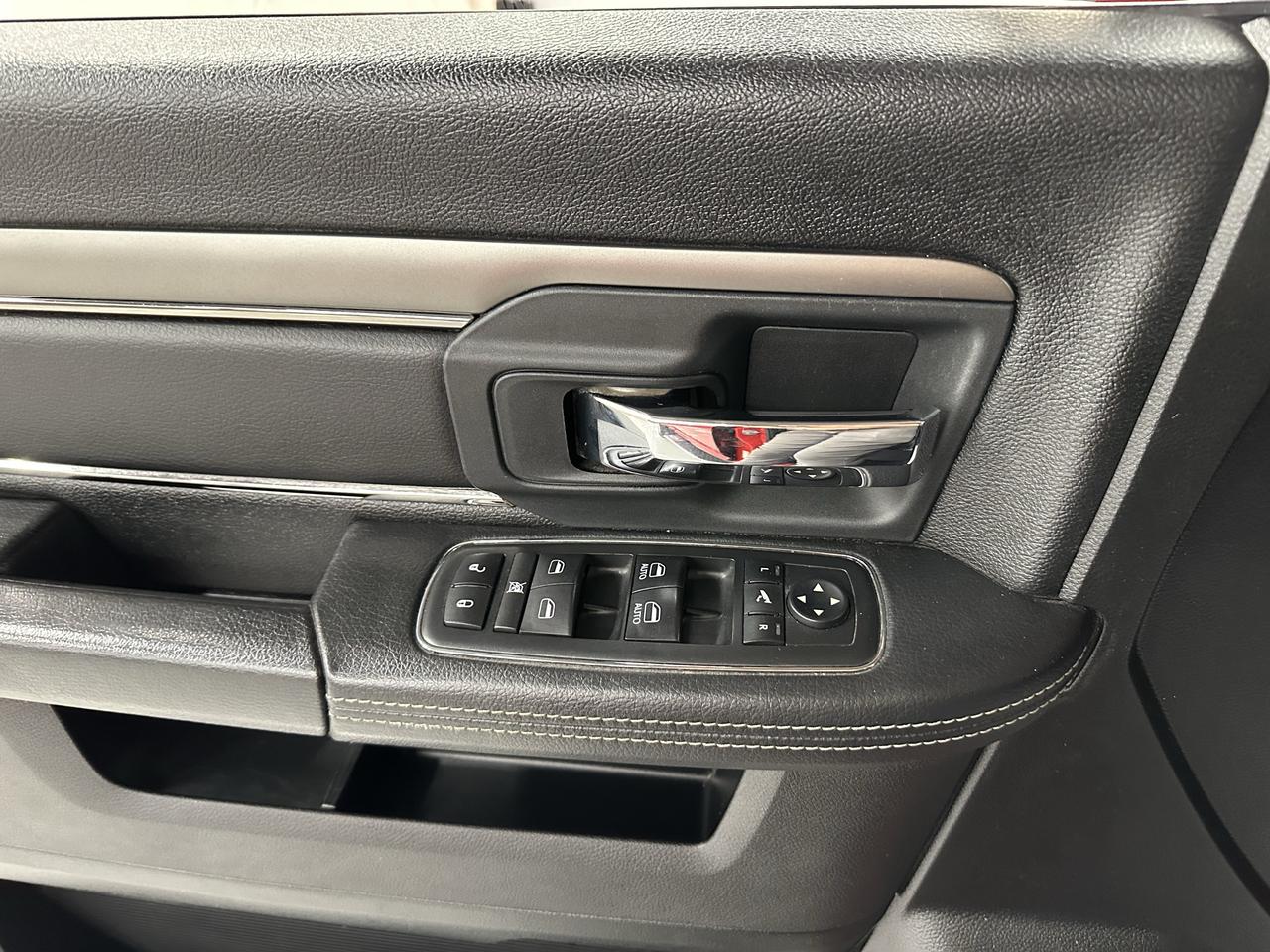 2017 RAM 1500 4WD Crew Cab 140.5" Sport Photo11