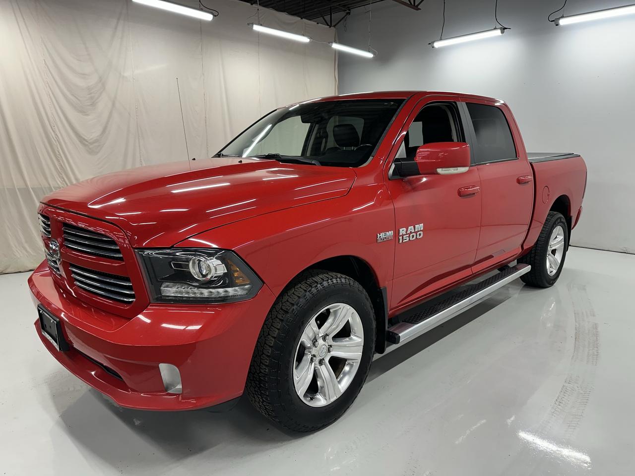 2017 RAM 1500 4WD Crew Cab 140.5" Sport Photo3