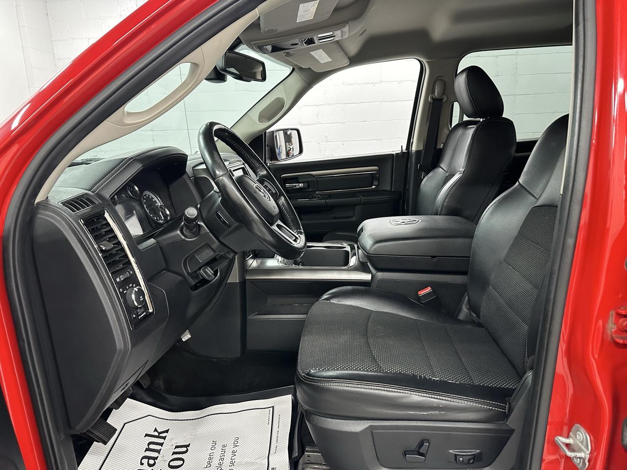 2017 RAM 1500 4WD Crew Cab 140.5" Sport Photo26