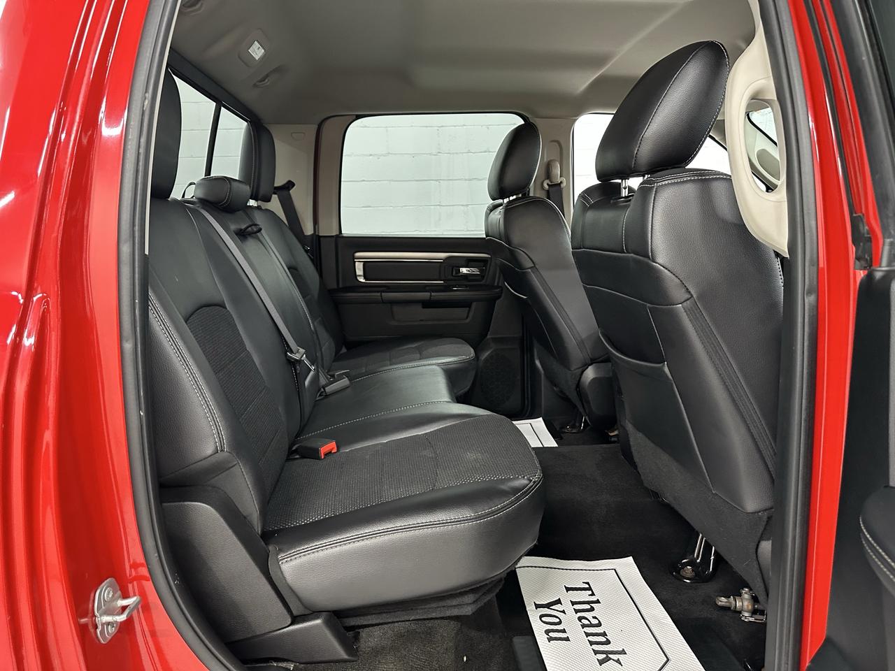 2017 RAM 1500 4WD Crew Cab 140.5" Sport Photo9