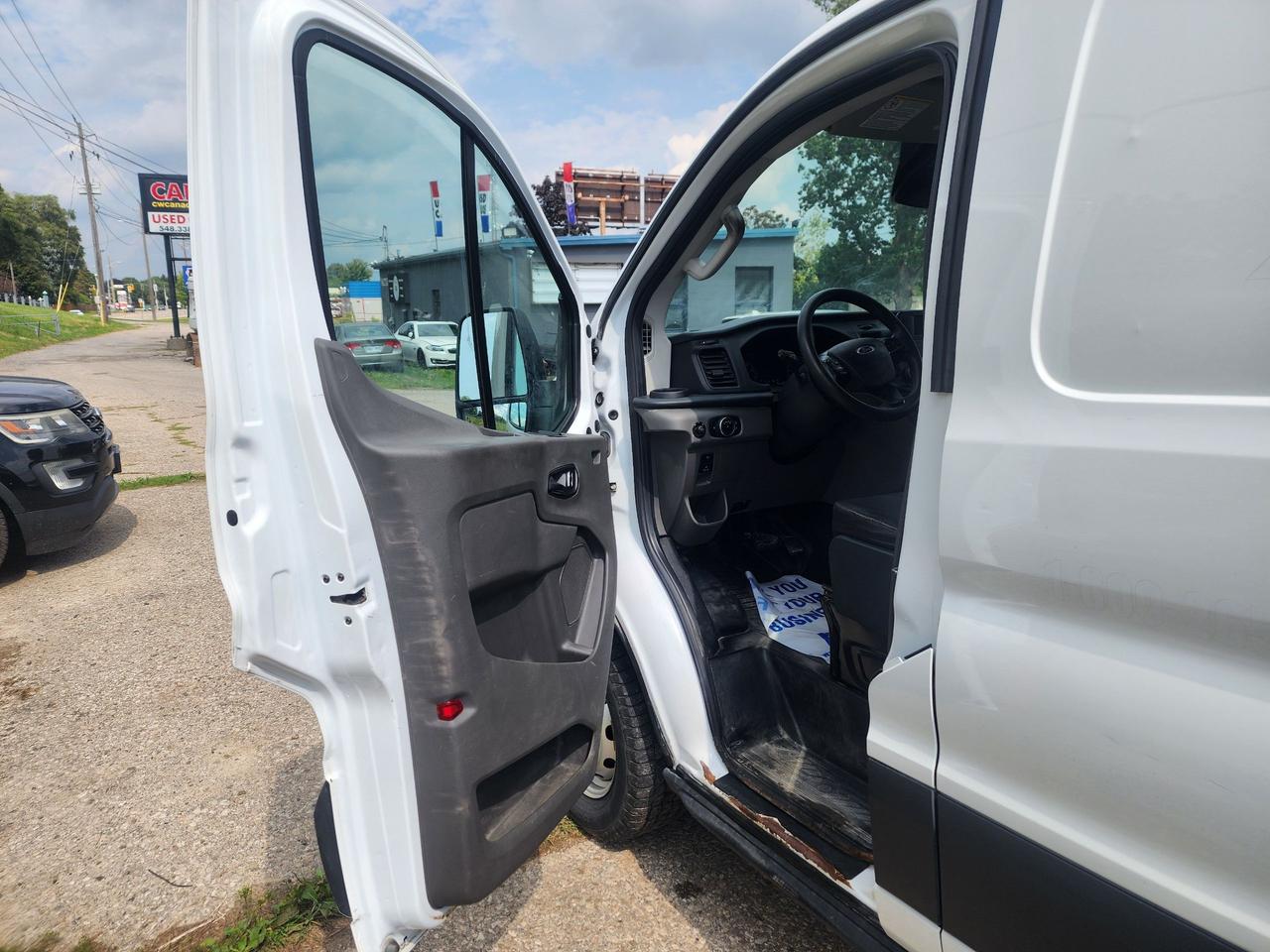 2023 Ford Transit Cargo Van Base l Clean Carfax l Serviced l Great Condt Photo