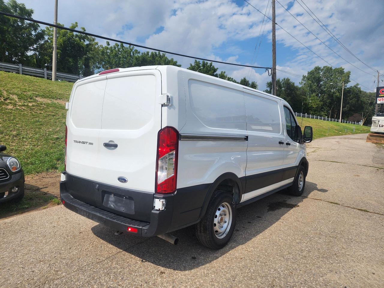 2023 Ford Transit Cargo Van Base l Clean Carfax l Serviced l Great Condt Photo