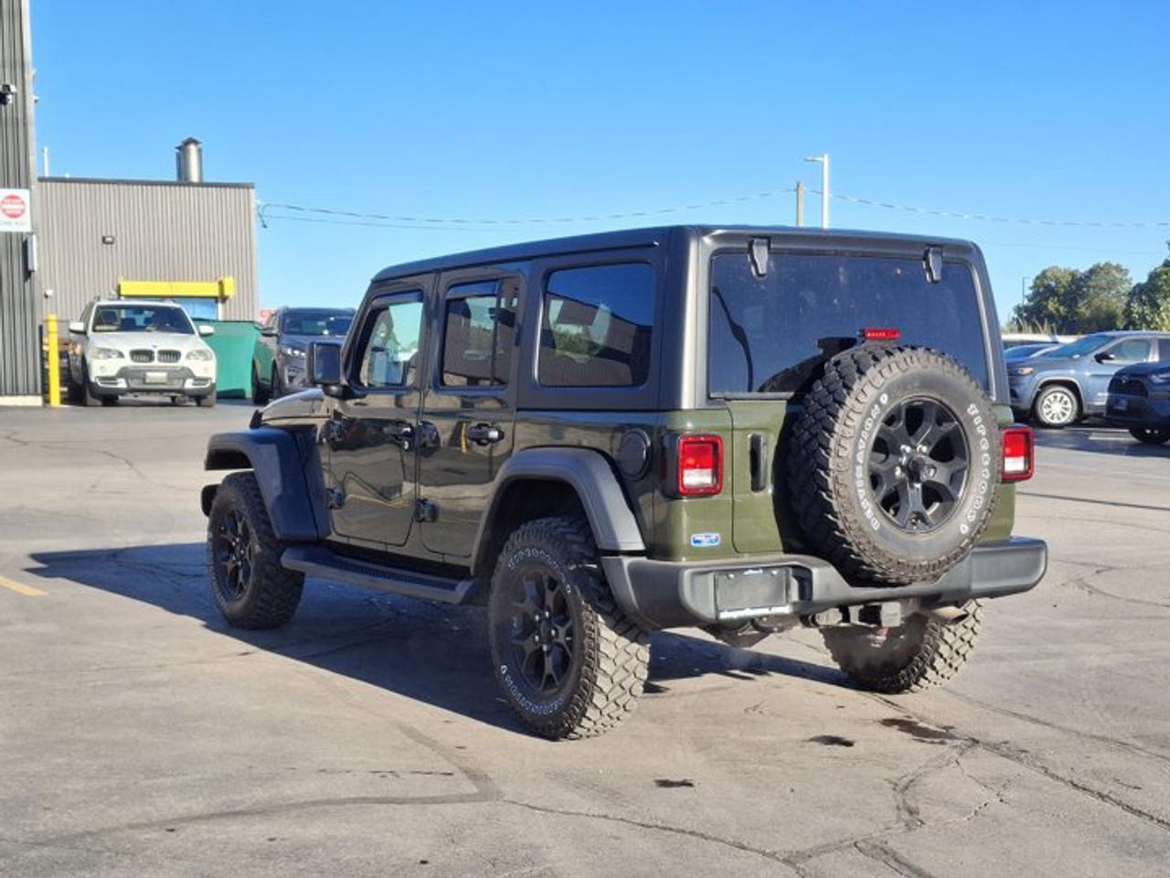 2023 Jeep Wrangler Willys 4-Door 4X4 | 3.6L w/ eTorque | Tech PKG | Nav | Heated Wheel + Seats | Tow Pkg | and More ! Photo