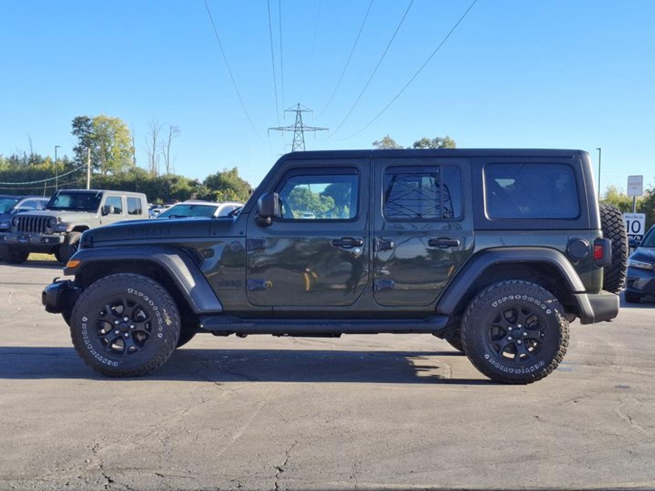 2023 Jeep Wrangler Willys 4-Door 4X4 | 3.6L w/ eTorque | Tech PKG | Nav | Heated Wheel + Seats | Tow Pkg | and More ! Photo1