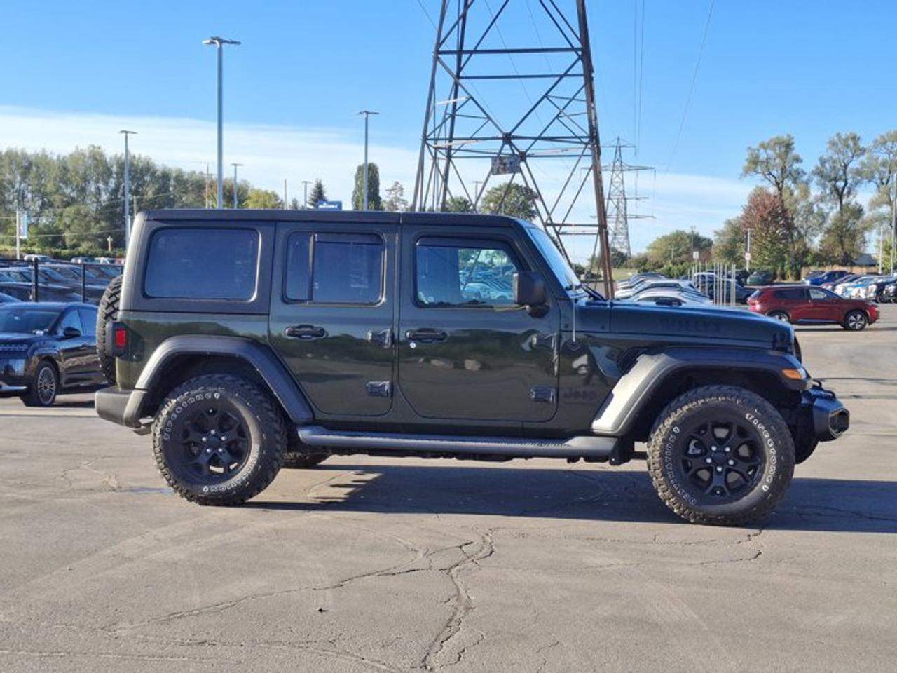 2023 Jeep Wrangler Willys 4-Door 4X4 | 3.6L w/ eTorque | Tech PKG | Nav | Heated Wheel + Seats | Tow Pkg | and More ! Photo