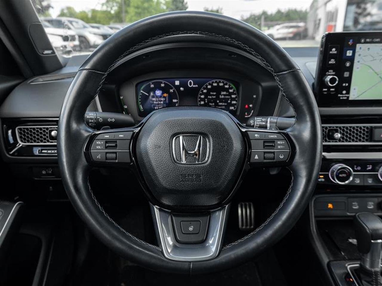 2025 Honda Civic Hybrid Sport Touring eCVT Sedan Photo