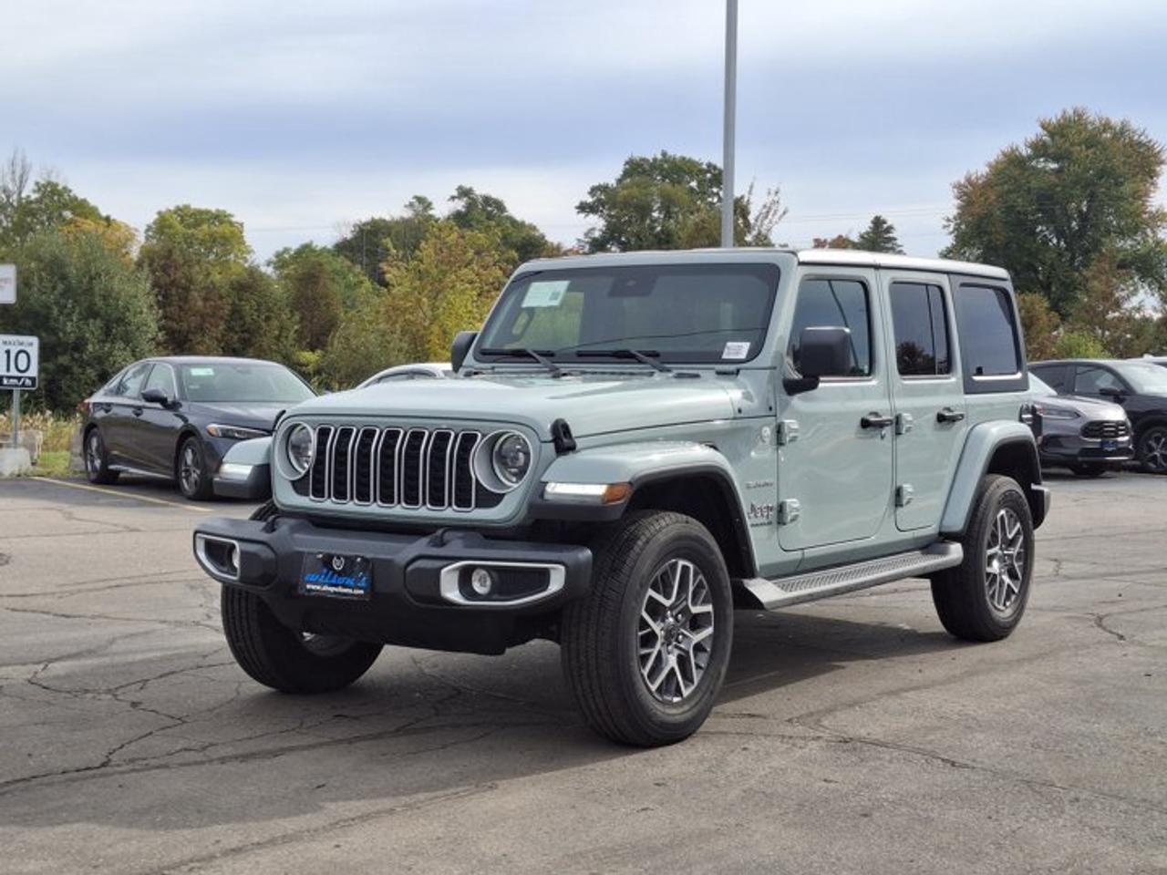 2024 Jeep Wrangler Sahara 4Dr 4X4 | V6 | Heated Wheel + Seats | Remote Start | CarPlay + Android | Rear Camera & More ! Photo