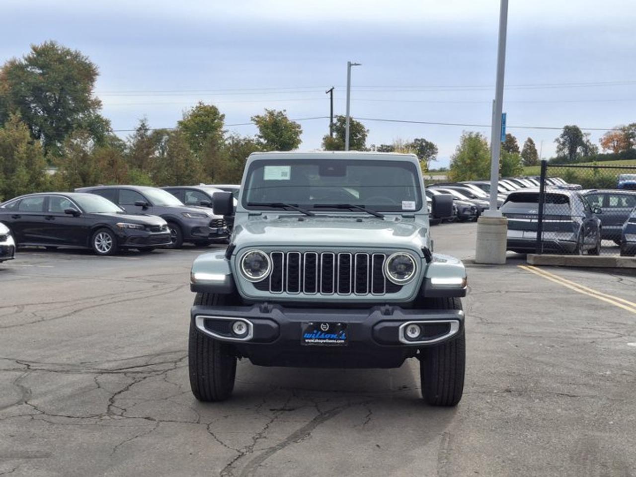 2024 Jeep Wrangler Sahara 4Dr 4X4 | V6 | Heated Wheel + Seats | Remote Start | CarPlay + Android | Rear Camera & More ! Photo