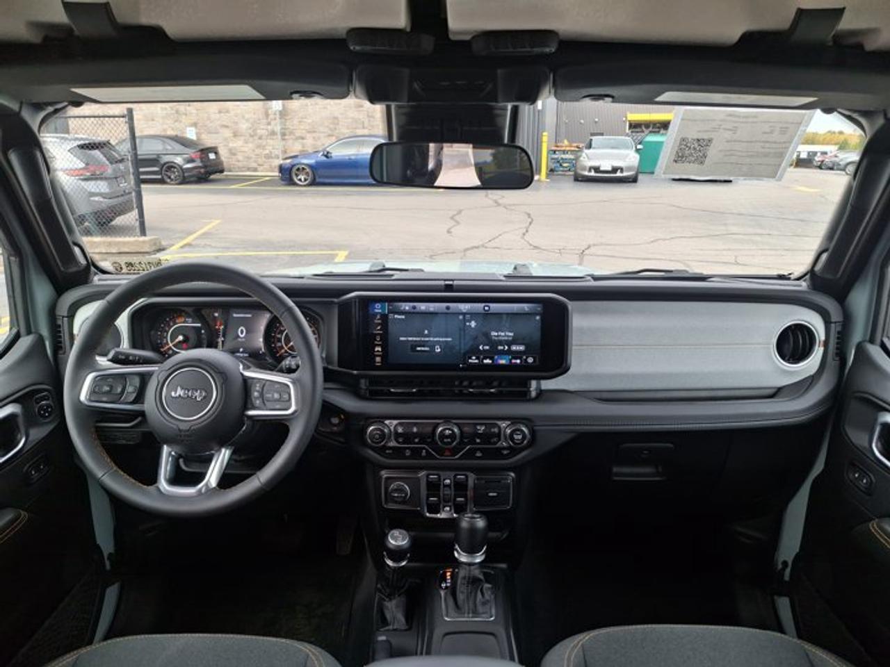 2024 Jeep Wrangler Sahara 4Dr 4X4 | V6 | Heated Wheel + Seats | Remote Start | CarPlay + Android | Rear Camera & More ! Photo