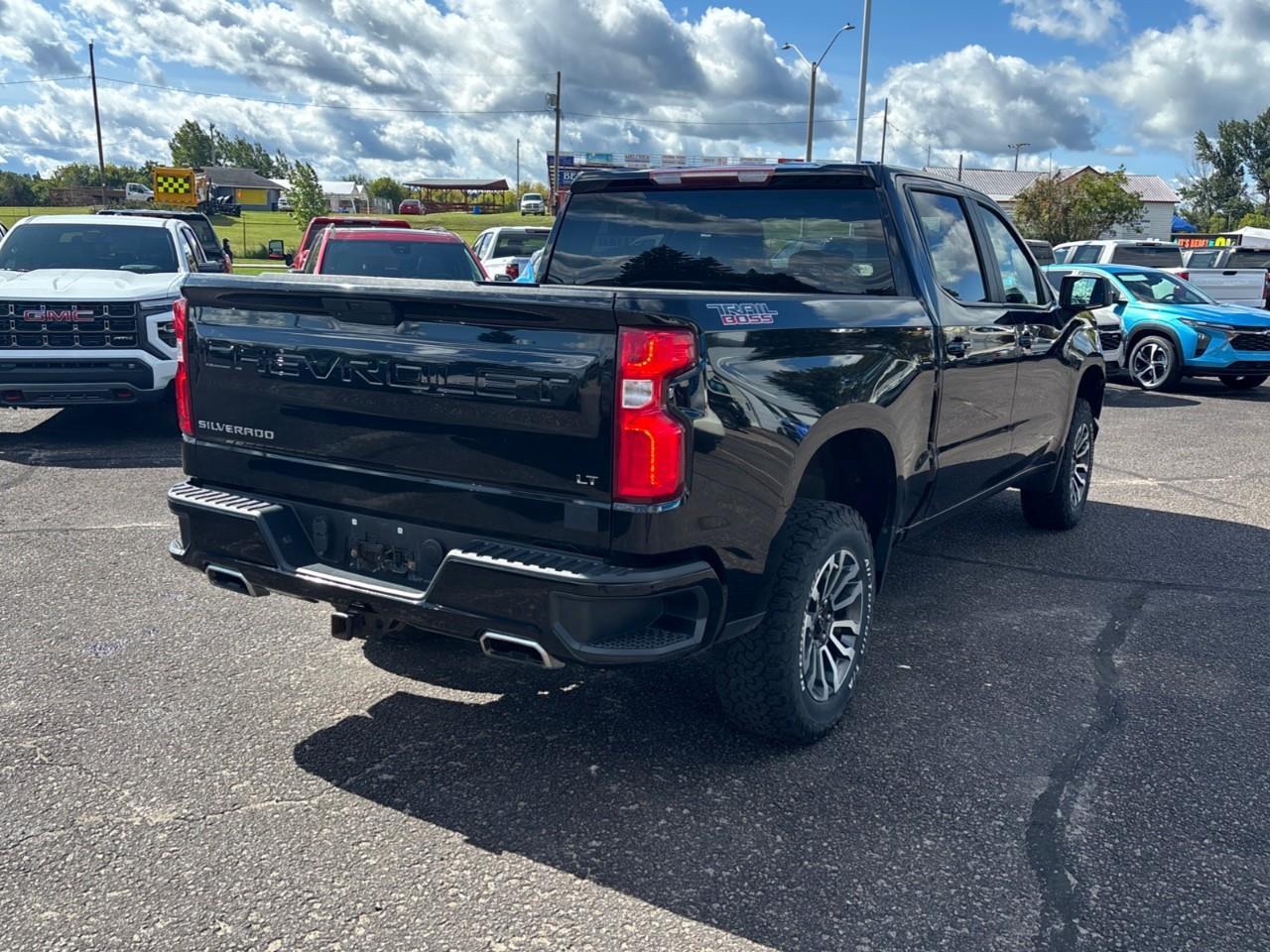 2021 Chevrolet Silverado 1500 LT Trail Boss Used 2021 5 Passenger V8 Gas Powered Crew Cab 4X4 Truck with a 2 Factory Installed LIft, Heated Front Seats, Heated Steering Wheel and a 8 Diagonal Touchscreen Radio with Apple CarPlay and Android Aut Photo