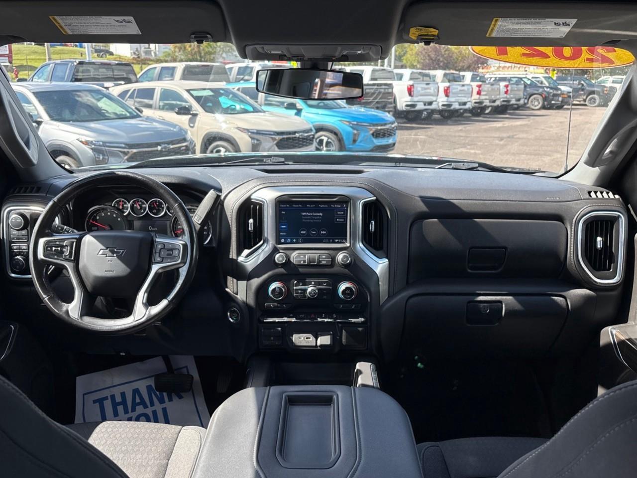 2021 Chevrolet Silverado 1500 LT Trail Boss Used 2021 5 Passenger V8 Gas Powered Crew Cab 4X4 Truck with a 2 Factory Installed LIft, Heated Front Seats, Heated Steering Wheel and a 8 Diagonal Touchscreen Radio with Apple CarPlay and Android Aut Photo