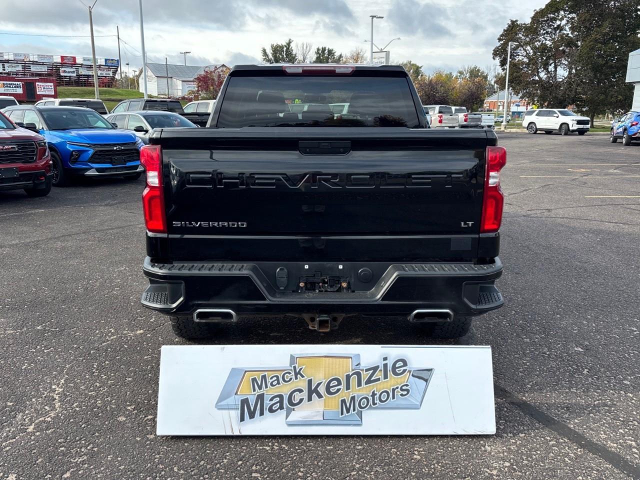 2021 Chevrolet Silverado 1500 LT Trail Boss Used 2021 5 Passenger V8 Gas Powered Crew Cab 4X4 Truck with a 2 Factory Installed LIft, Heated Front Seats, Heated Steering Wheel and a 8 Diagonal Touchscreen Radio with Apple CarPlay and Android Aut Photo