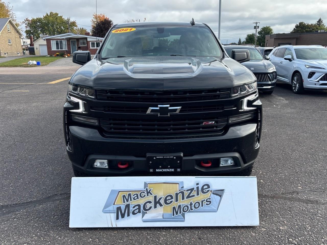 2021 Chevrolet Silverado 1500 LT Trail Boss Used 2021 5 Passenger V8 Gas Powered Crew Cab 4X4 Truck with a 2 Factory Installed LIft, Heated Front Seats, Heated Steering Wheel and a 8 Diagonal Touchscreen Radio with Apple CarPlay and Android Aut Photo