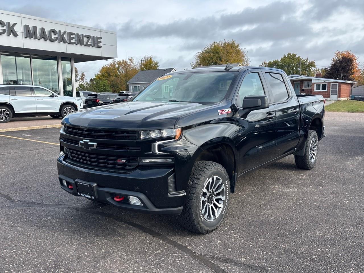 2021 Chevrolet Silverado 1500 LT Trail Boss Used 2021 5 Passenger V8 Gas Powered Crew Cab 4X4 Truck with a 2 Factory Installed LIft, Heated Front Seats, Heated Steering Wheel and a 8 Diagonal Touchscreen Radio with Apple CarPlay and Android Aut Photo