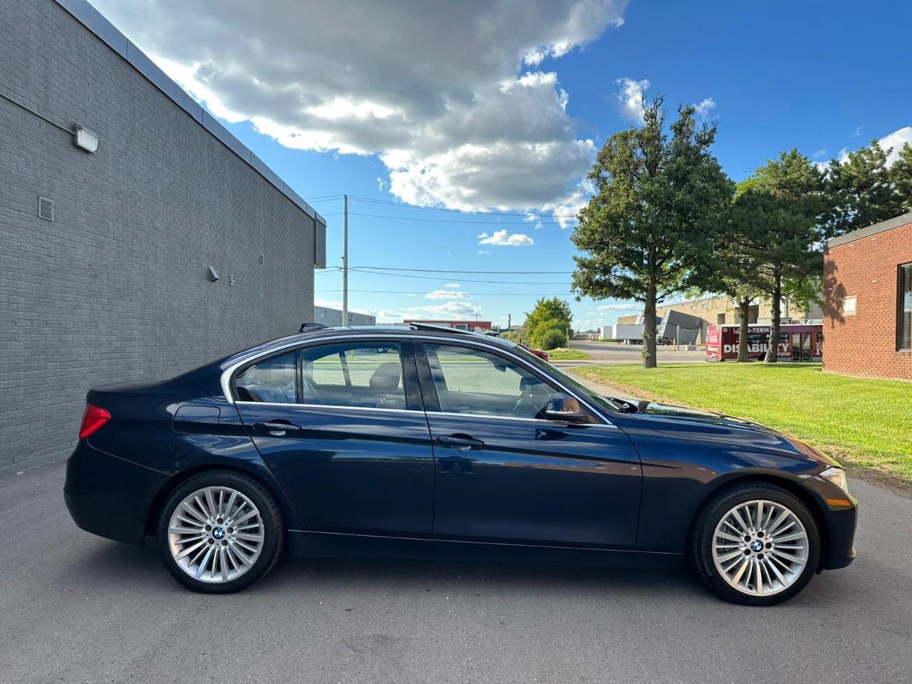 2013 BMW 3 Series 4dr Sdn 335i xDrive AWD Photo