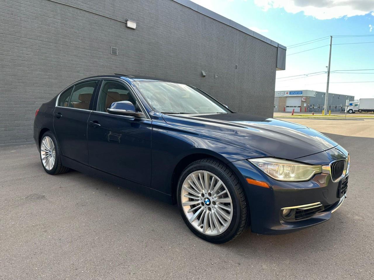 2013 BMW 3 Series 4dr Sdn 335i xDrive AWD Photo