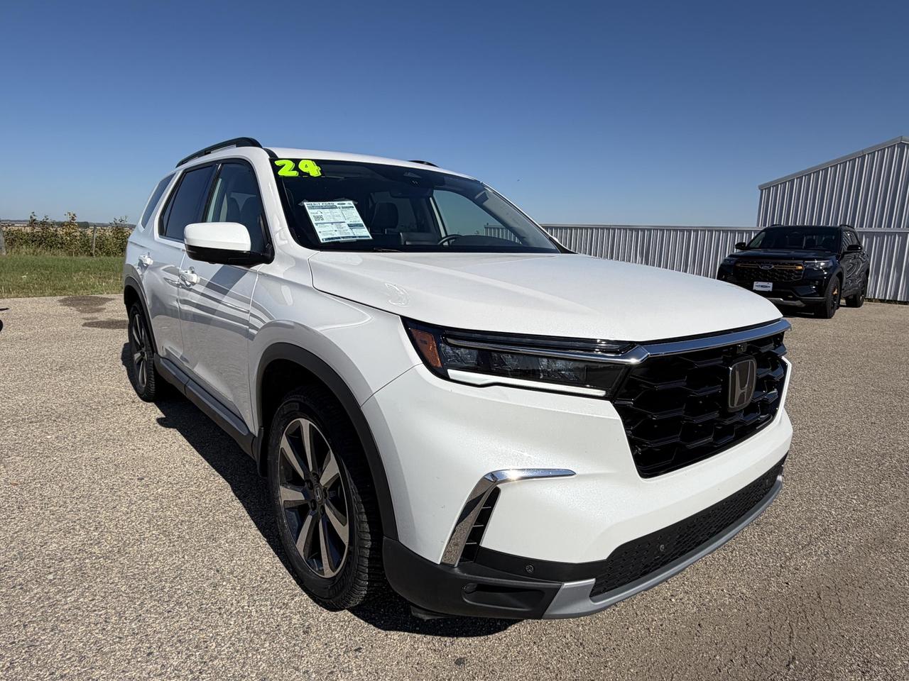 2024 Honda Pilot TOURING 3.5L V6 Photo1