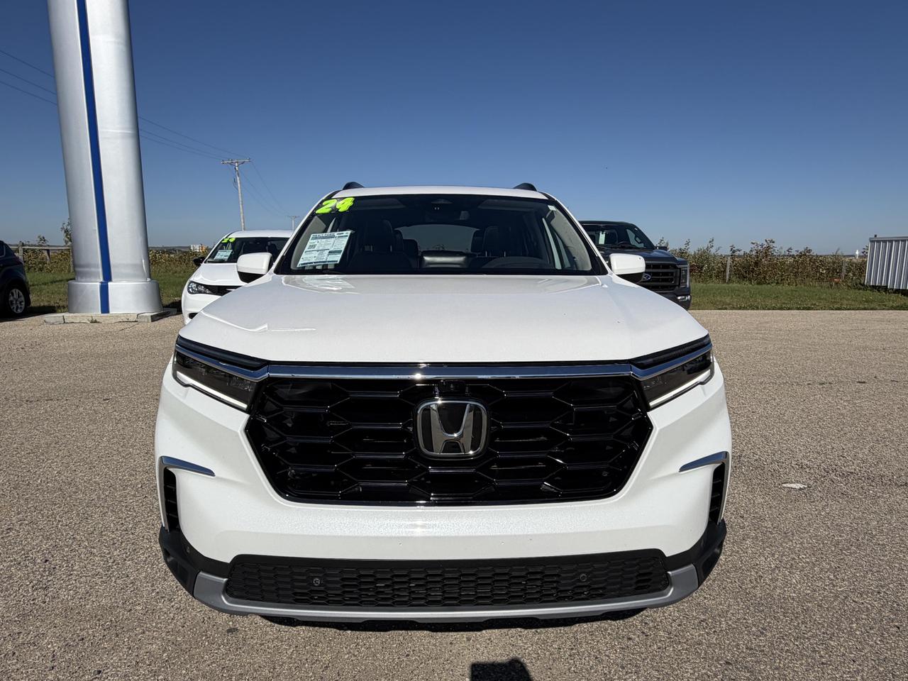2024 Honda Pilot TOURING 3.5L V6 Photo2