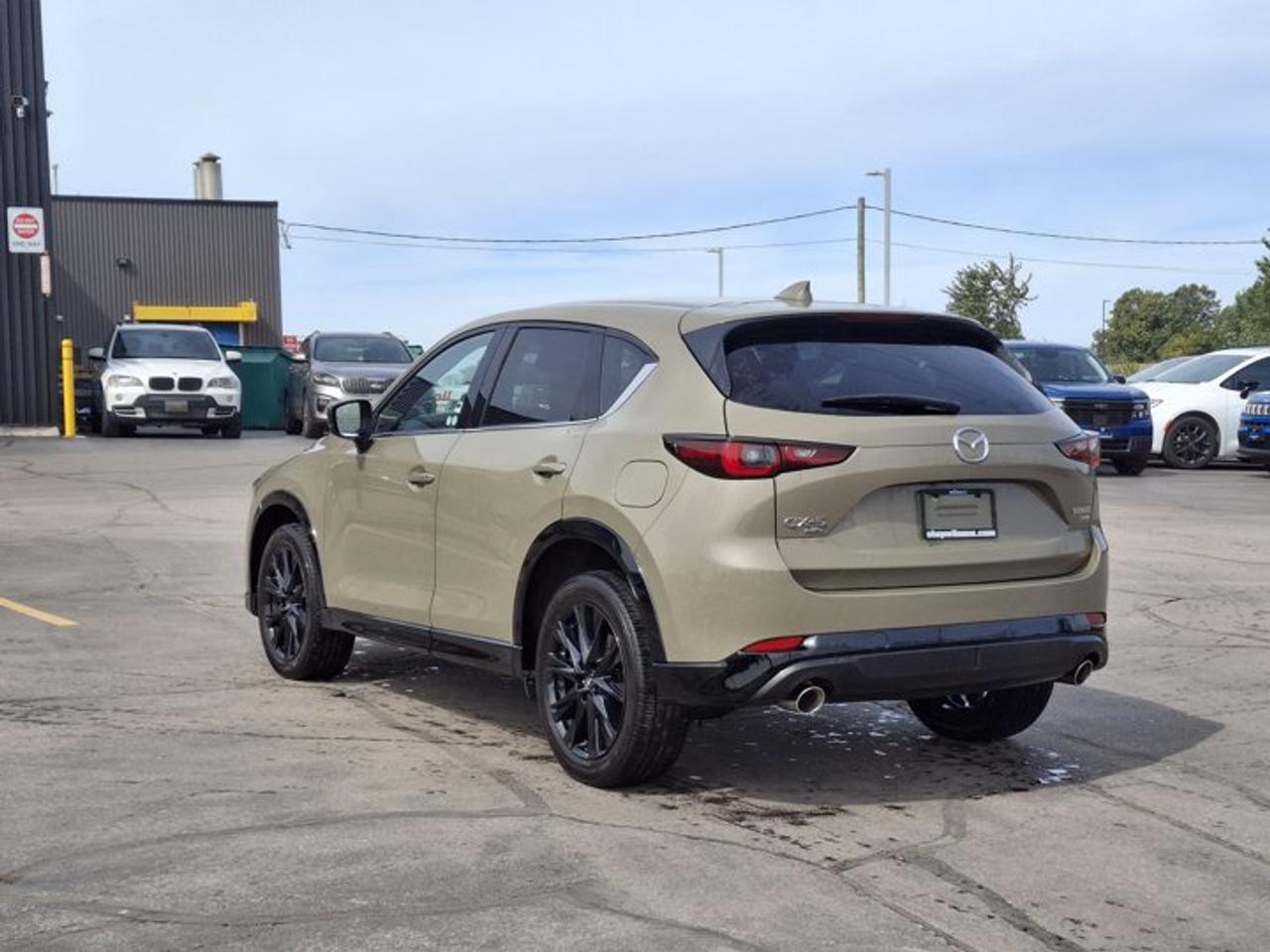 2024 Mazda CX-5 Suna AWD | Turbo | Leather/Suede | Sunroof | HUD | Cooled + Heated Seats | Bose | Nav | and More ! Photo