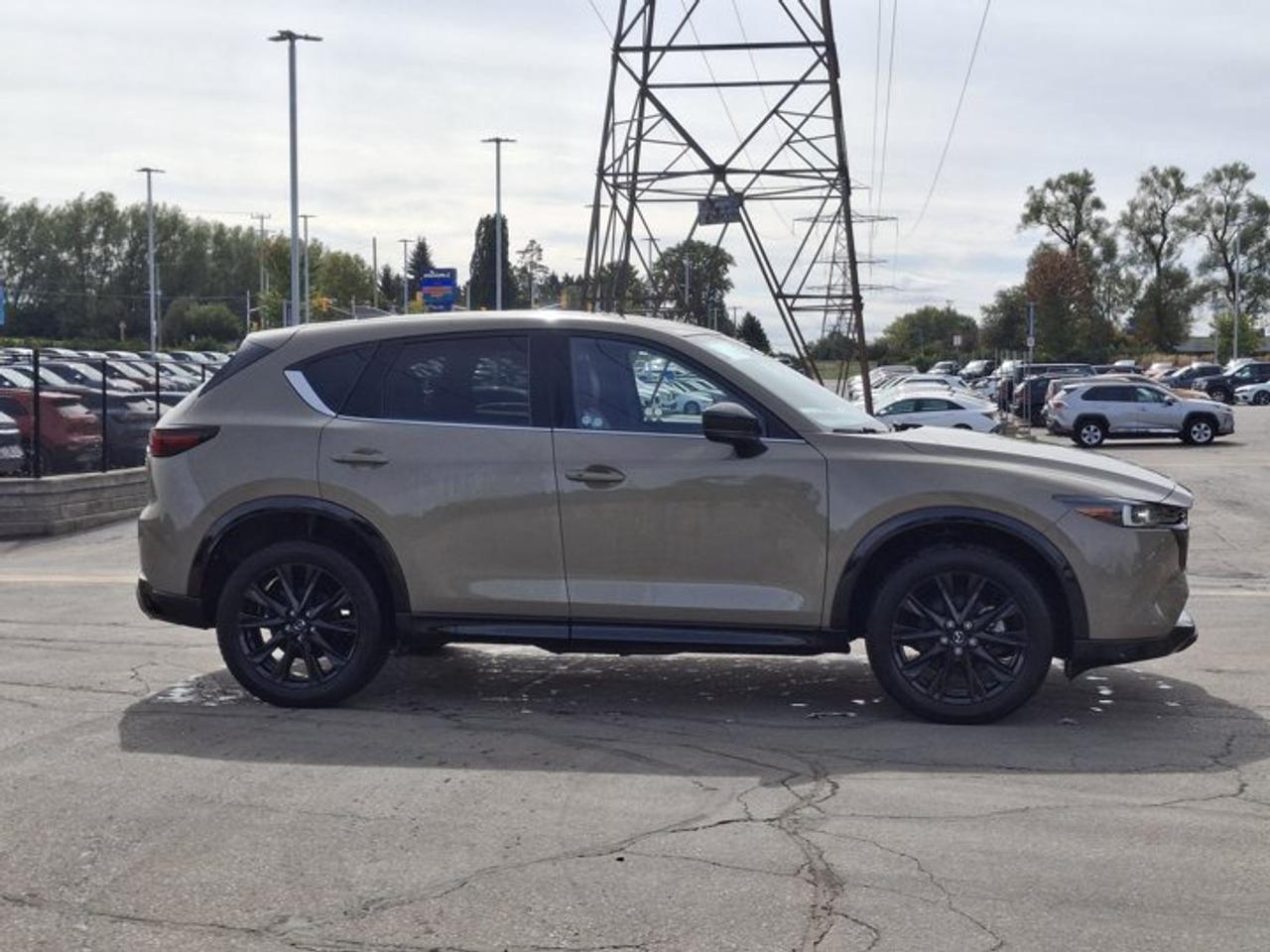 2024 Mazda CX-5 Suna AWD | Turbo | Leather/Suede | Sunroof | HUD | Cooled + Heated Seats | Bose | Nav | and More ! Photo