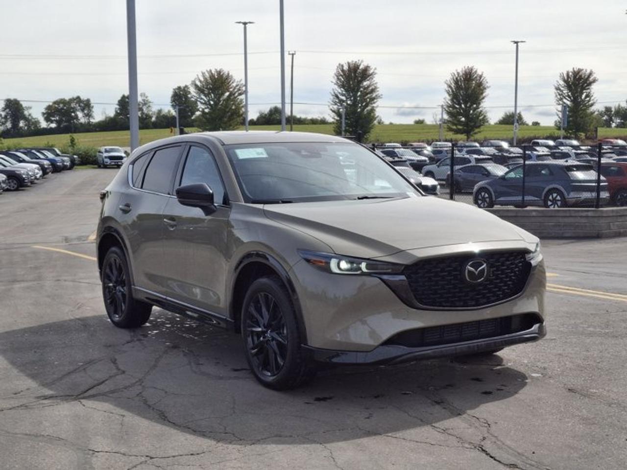 2024 Mazda CX-5 Suna AWD | Turbo | Leather/Suede | Sunroof | HUD | Cooled + Heated Seats | Bose | Nav | and More ! Photo