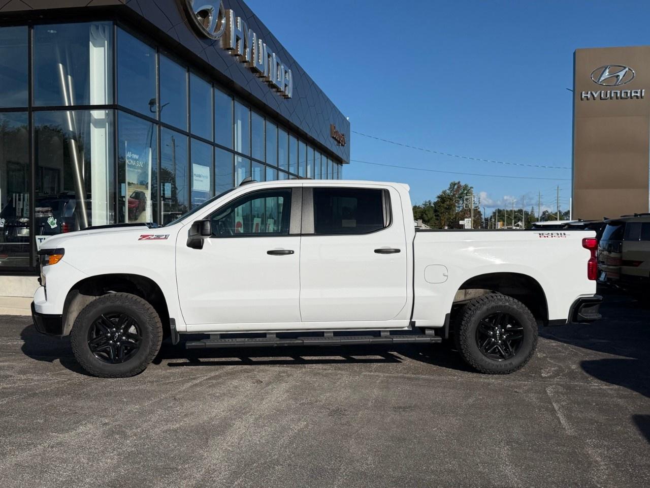 2024 Chevrolet Silverado 1500 Crew Cab Short Box 4-Wheel Drive Custom Trail Boss Photo2