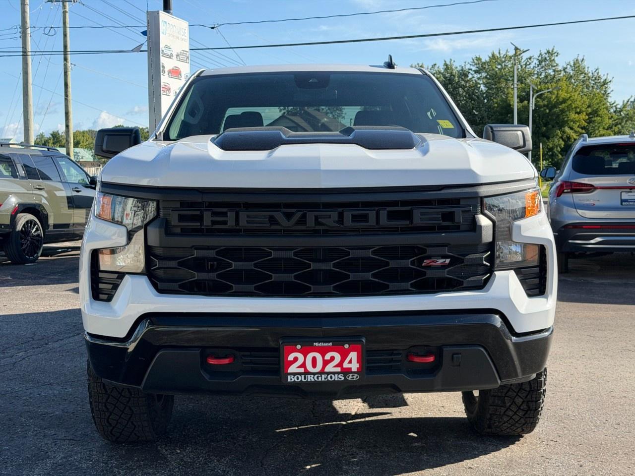 2024 Chevrolet Silverado 1500 Crew Cab Short Box 4-Wheel Drive Custom Trail Boss Photo