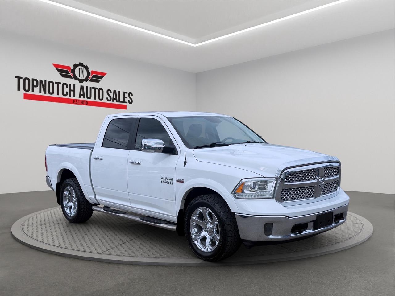 2017 RAM 1500 4WD Crew Cab 140.5" Laramie Photo