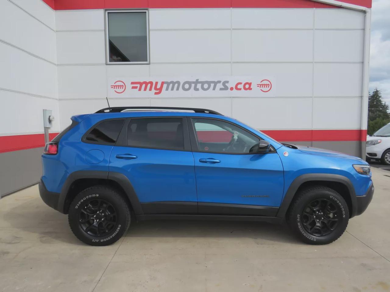 2022 Jeep Cherokee Trailhawk | 4WD | Automatic | Alloy Wheels | All-Terrain Tires | Heated Seats | Heated Steering Wheel | Power Driver Seat | Dual-Zone Climate Control | Touchscreen Display | Navigation | Bluetooth | Back-Up Camera | Blind Spot Monitor | Cross-Traffic Aler Photo