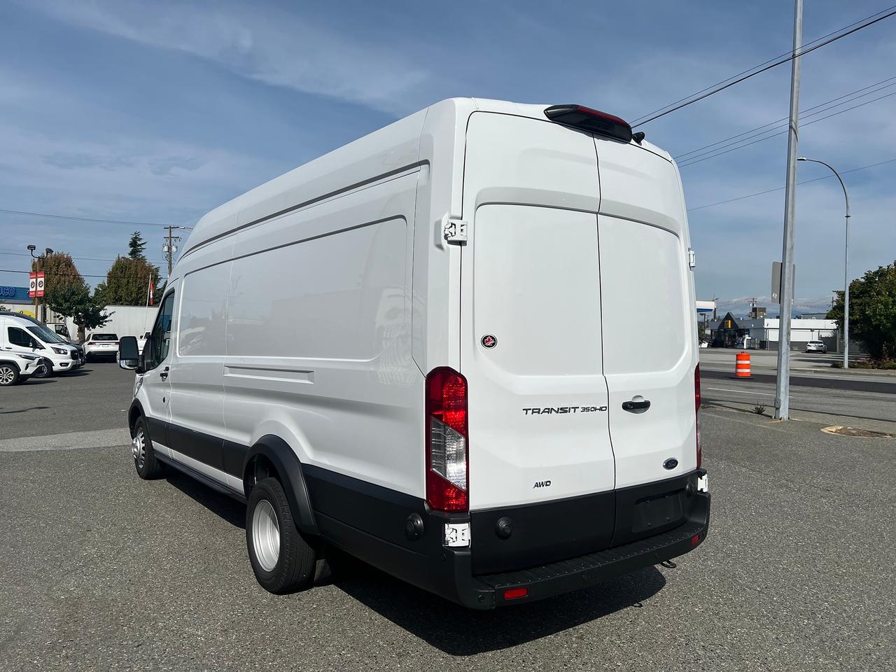 2025 Ford Transit Cargo Van T-350 HD 148" EL Hi Rf 9950 GVWR DRW AWD Photo4