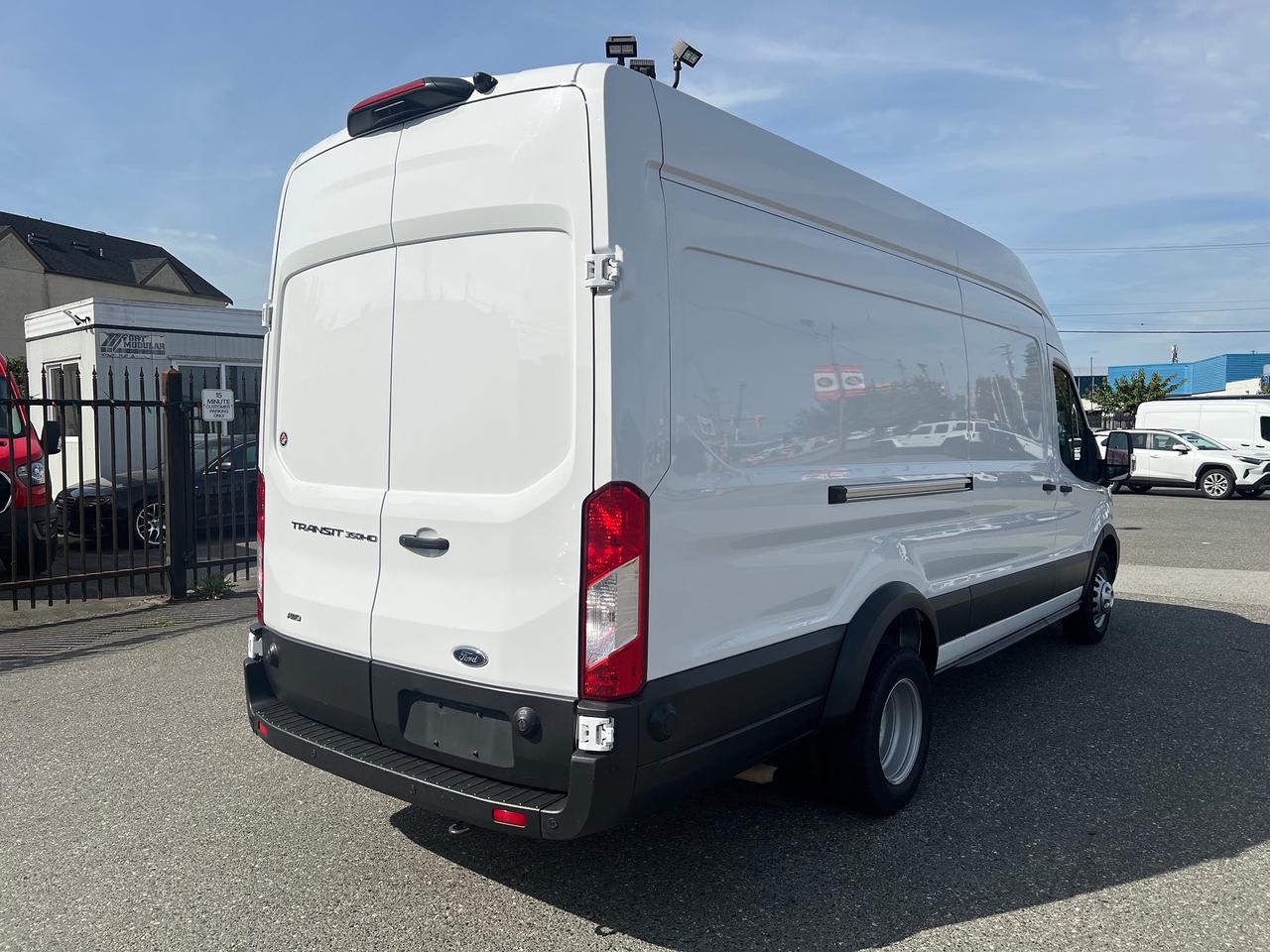 2025 Ford Transit Cargo Van T-350 HD 148" EL Hi Rf 9950 GVWR DRW AWD Photo