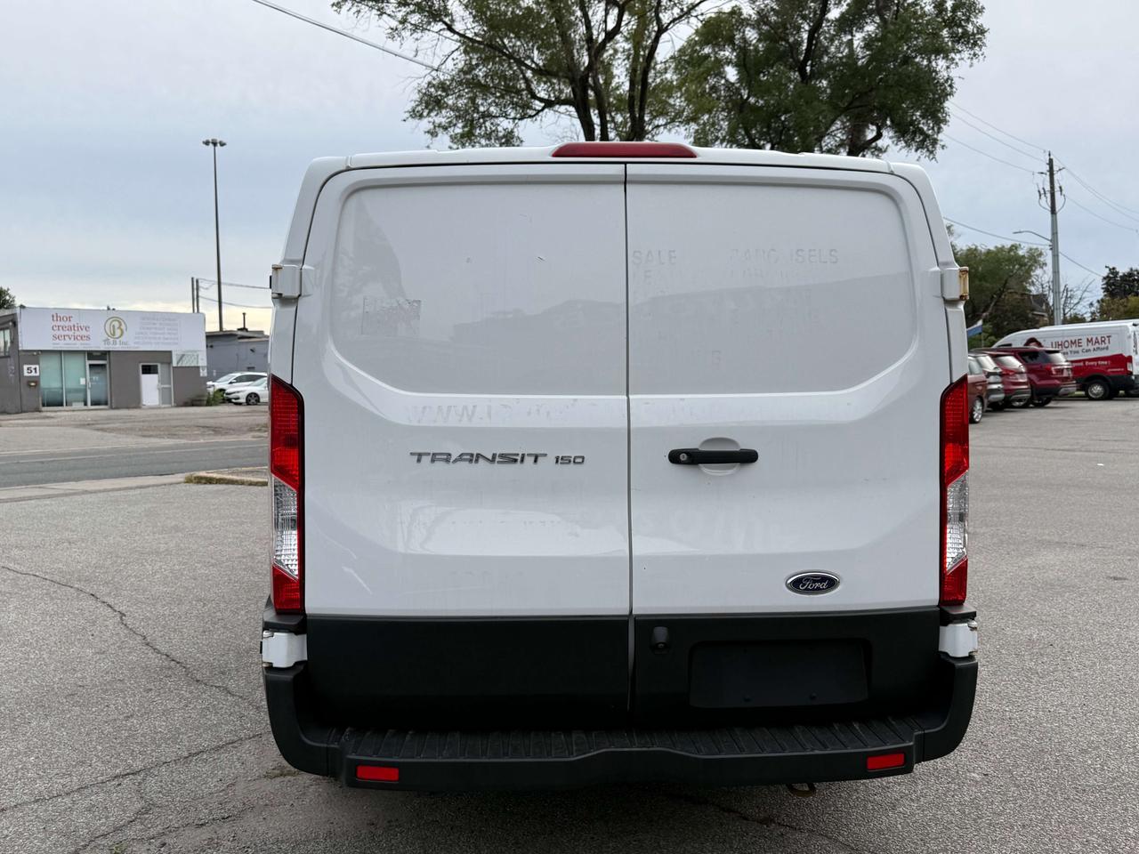2019 Ford Transit Low Roof l T150 l RWD l 130" l Reverse Cam l V6 l Photo
